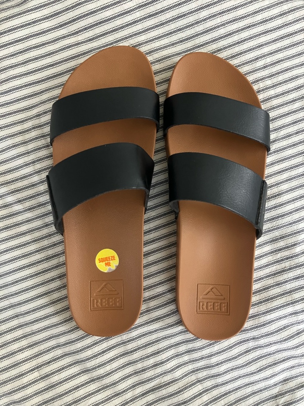 Reef Black Strappy Slide Sandals with Brown Footbed